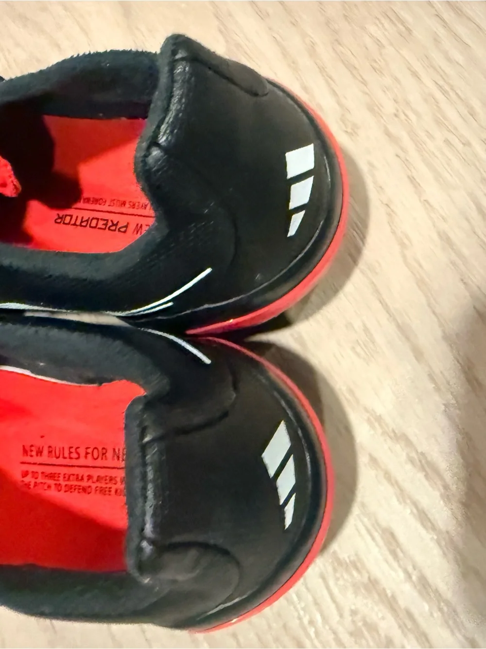 adidas Predator kids Soccer cleats in Black, Red & White